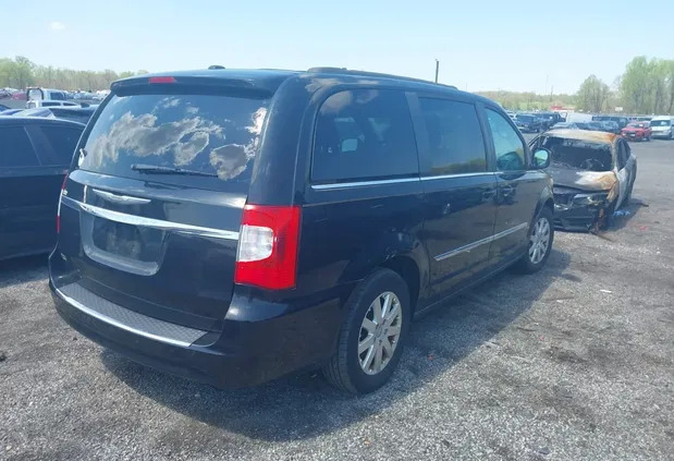 chrysler mazowieckie Chrysler Town &amp; Country cena 33000 przebieg: 145441, rok produkcji 2014 z Rzgów